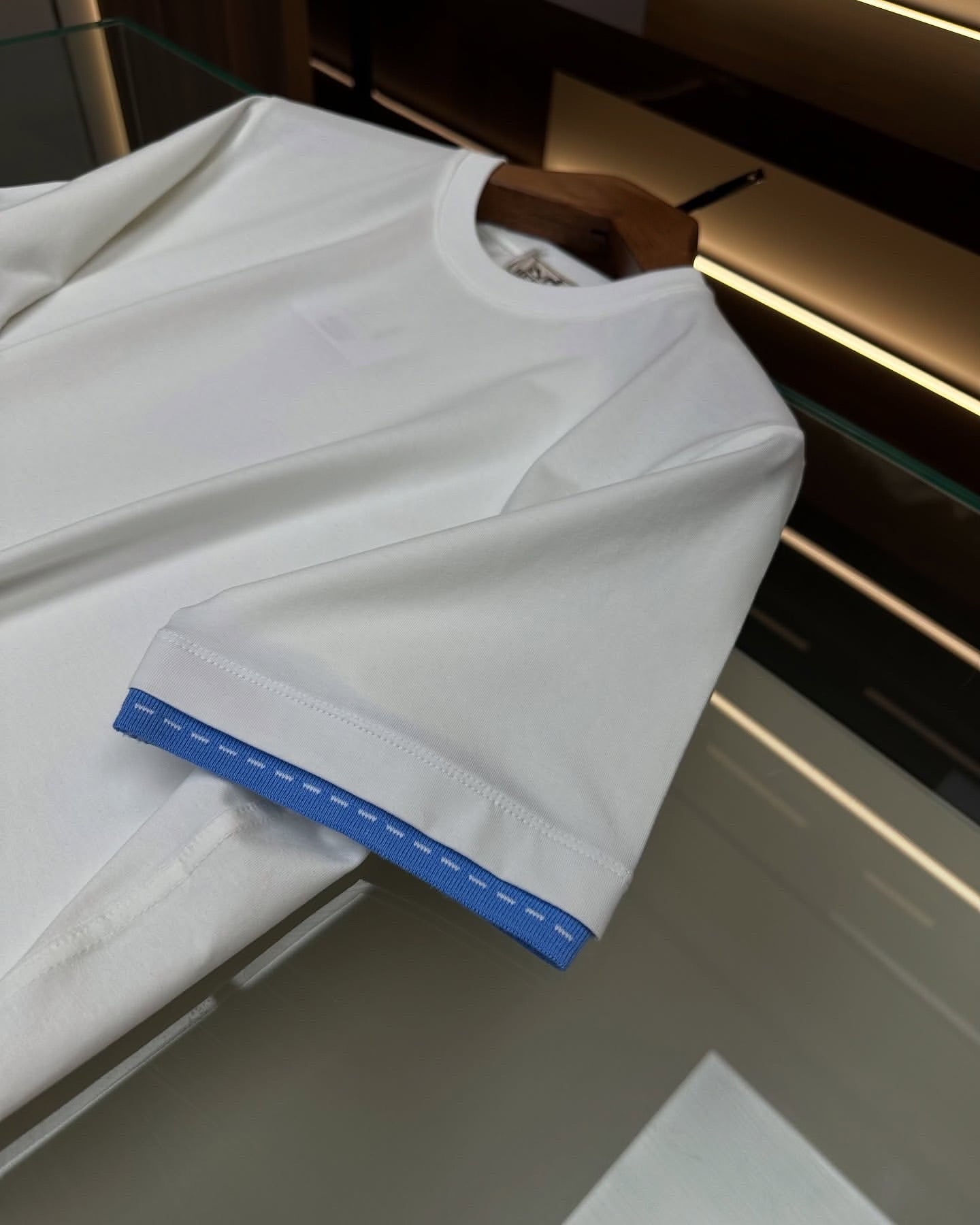 Hermès White Cotton T-Shirt with Blue Cuff Detail