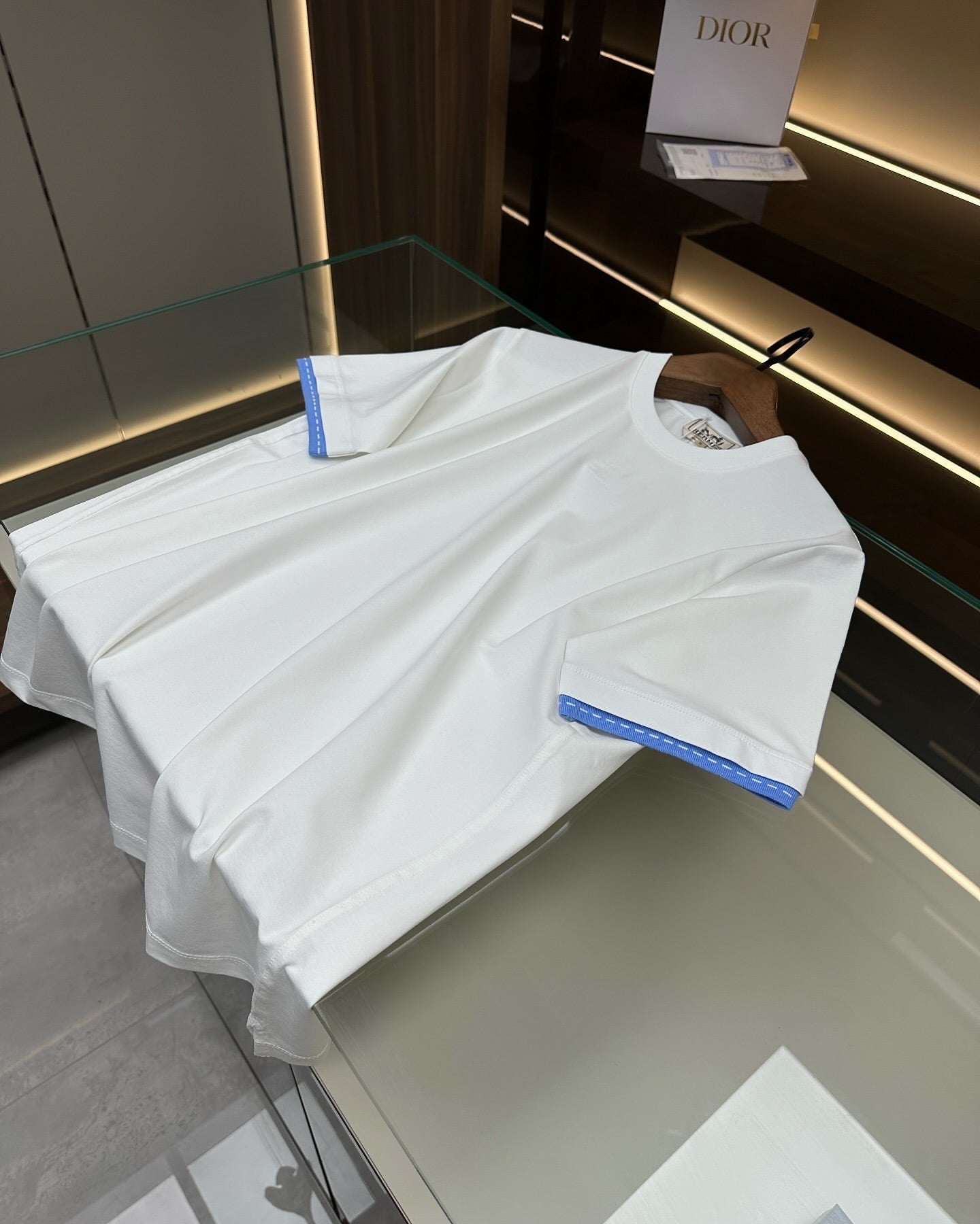 Hermès White Cotton T-Shirt with Blue Cuff Detail