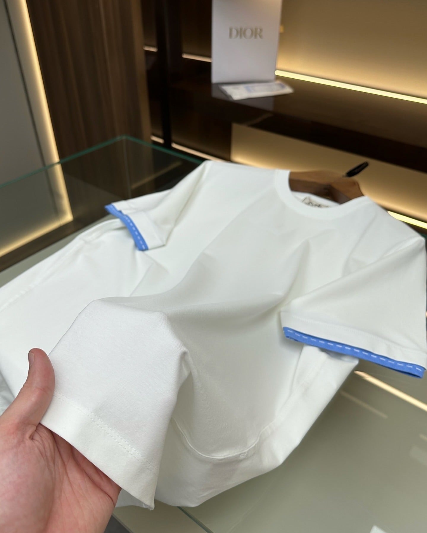 Hermès White Cotton T-Shirt with Blue Cuff Detail