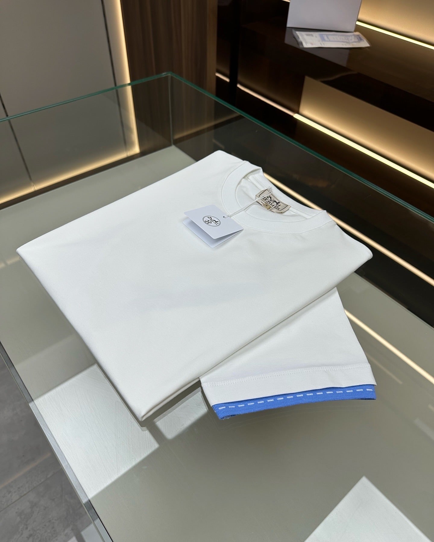 Hermès White Cotton T-Shirt with Blue Cuff Detail