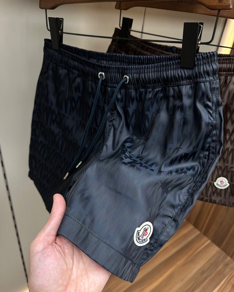 Moncler Allover Logo Swim Shorts – Black & Brown