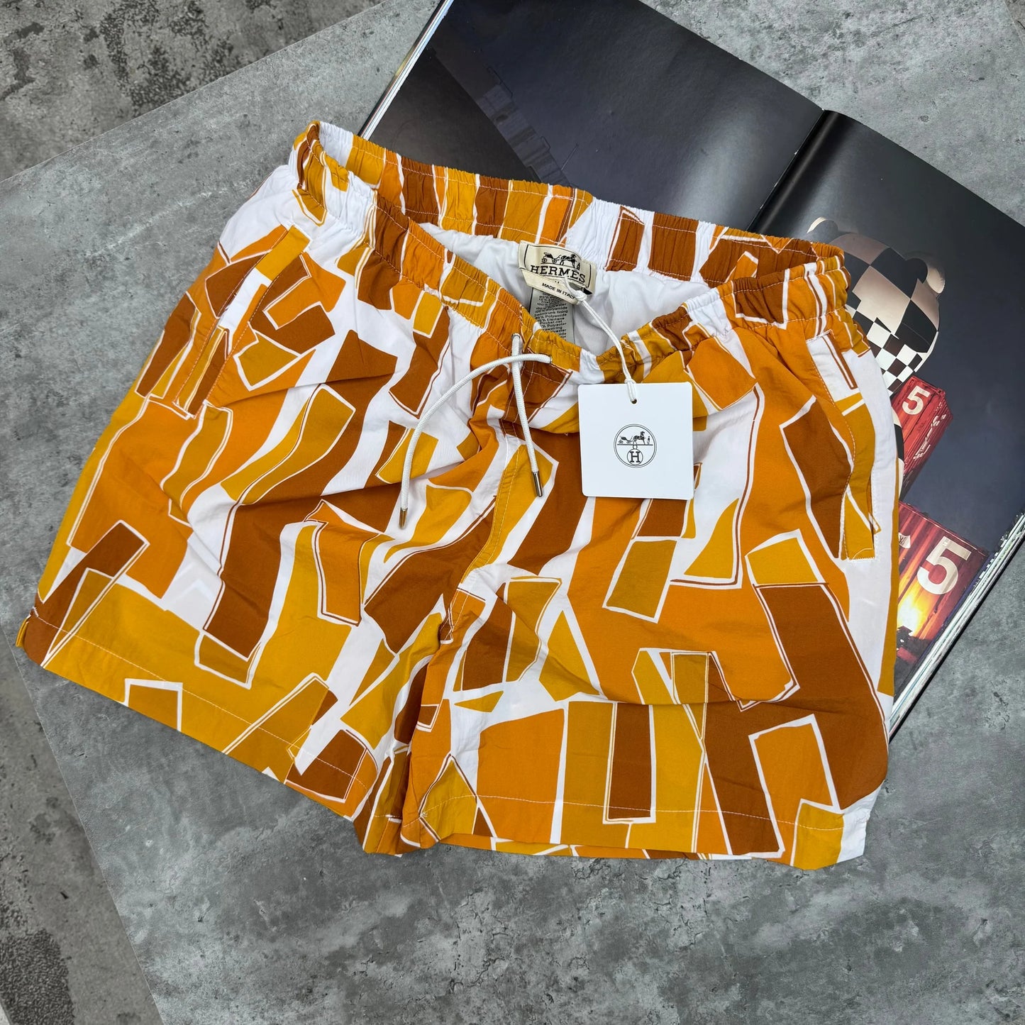 Hermès Geo-Print Swim Shorts – Orange & White