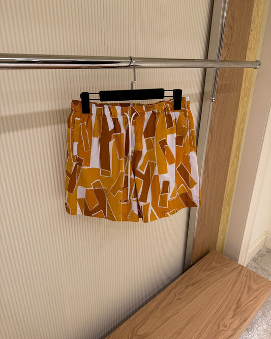 Hermès Geo-Print Swim Shorts – Orange & White