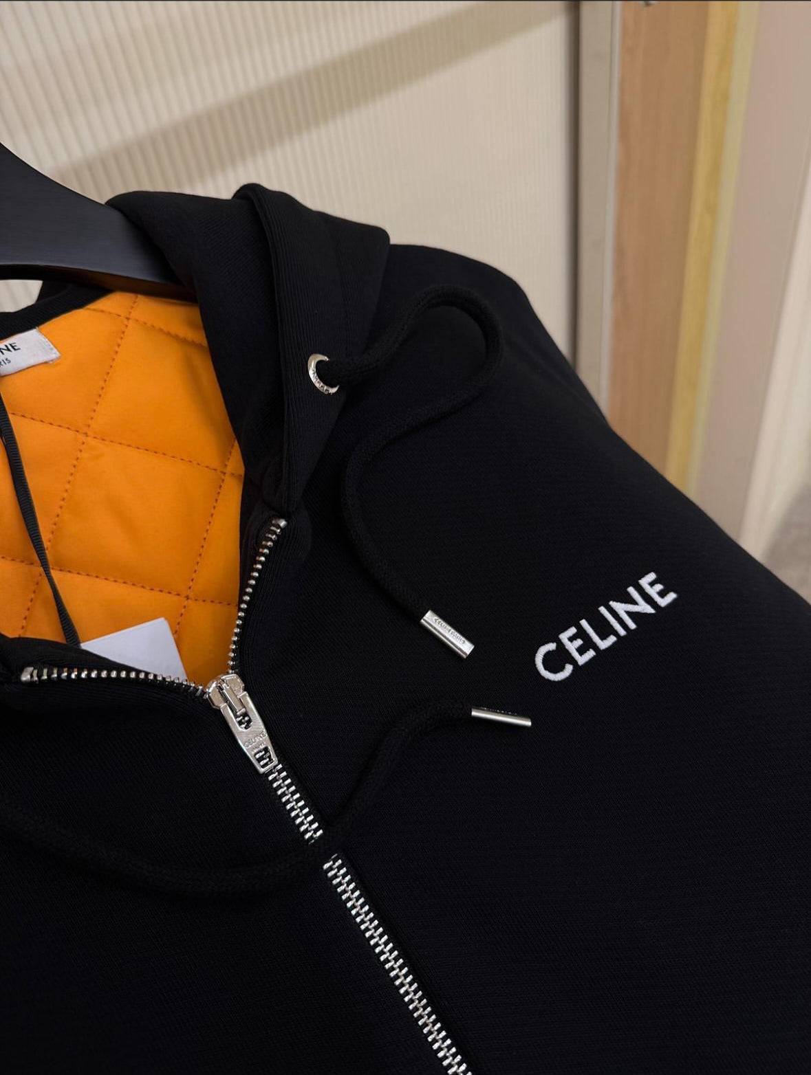the CELINE Zipped Quilted Hoodie in Cotton Fleece.