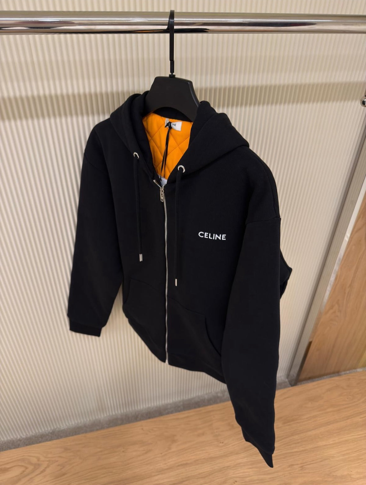 the CELINE Zipped Quilted Hoodie in Cotton Fleece.